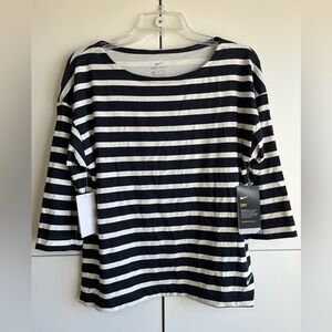 NWT. Nike Women's Golf Navy and White Striped Dri-Fit   Size Medium.